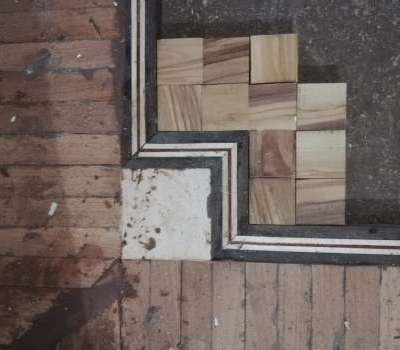 Parquet a disegno con essenze a intarsio